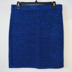 Knitted blue skirt.